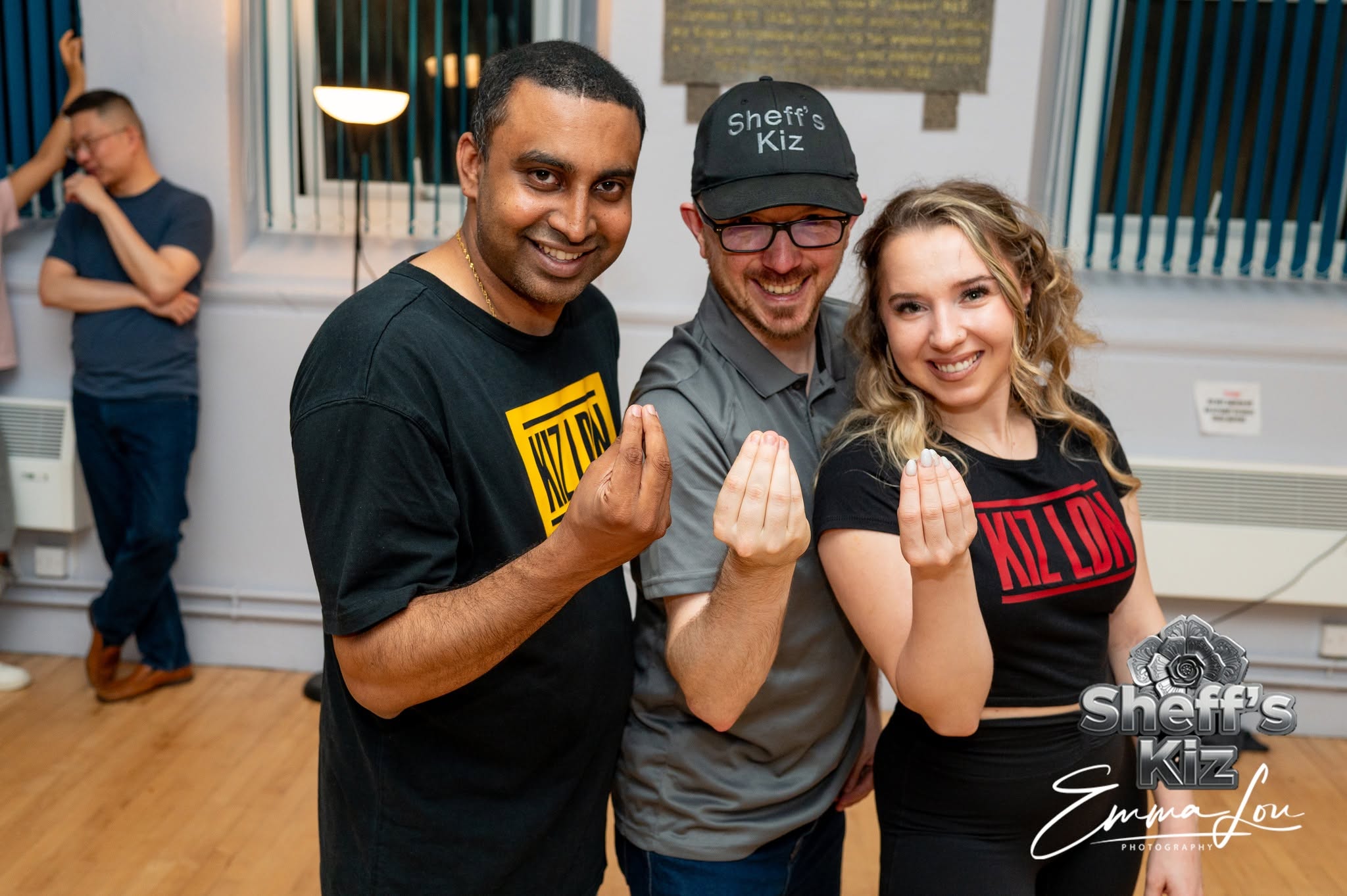 JayJay, Natalia, and Sheff's Kiz host smiling together